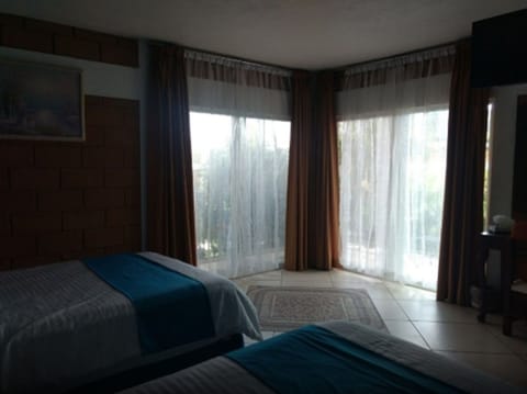 Family Double Room, 2 Double Beds, Mountain View | Iron/ironing board, free WiFi, bed sheets