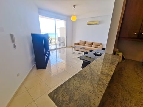 Apartment, 1 Bedroom | Living area | Flat-screen TV