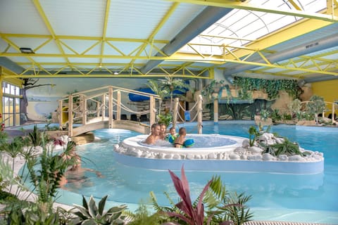 Indoor pool, outdoor pool, sun loungers, lifeguards on site