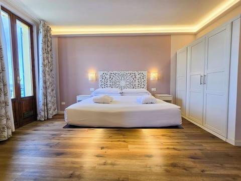 Luxury Room | Blackout drapes, iron/ironing board, free WiFi, bed sheets