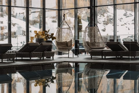 Indoor pool, pool umbrellas, sun loungers