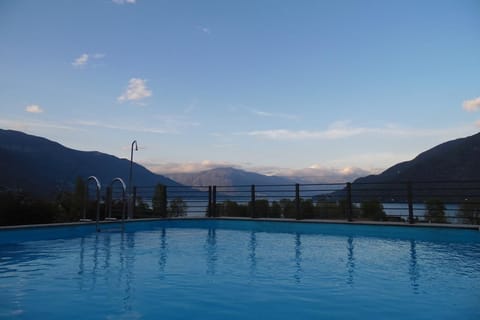 Seasonal outdoor pool, pool umbrellas, sun loungers