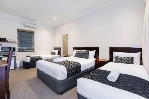 Executive Family Room | Premium bedding, desk, iron/ironing board, free WiFi