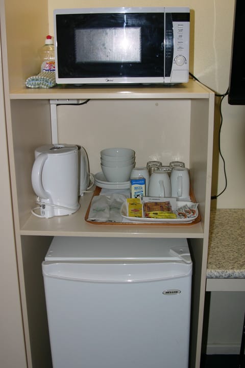 Fridge, microwave, coffee/tea maker, electric kettle