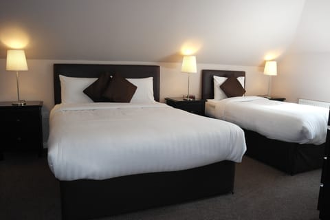 Superior Family Room | Premium bedding, minibar, desk, blackout drapes