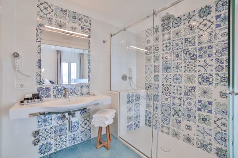 Romantic Studio Suite, Sea View | Bathroom | Shower, rainfall showerhead, designer toiletries, hair dryer