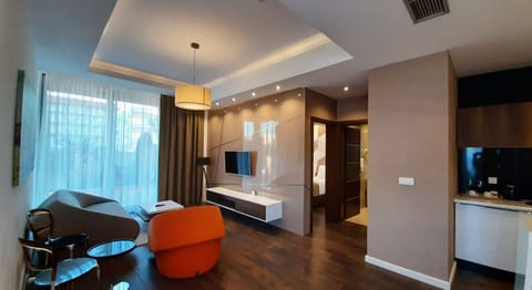 Luxury Apartment, Accessible, Non Smoking | Living area | 32-inch LED TV with satellite channels, TV