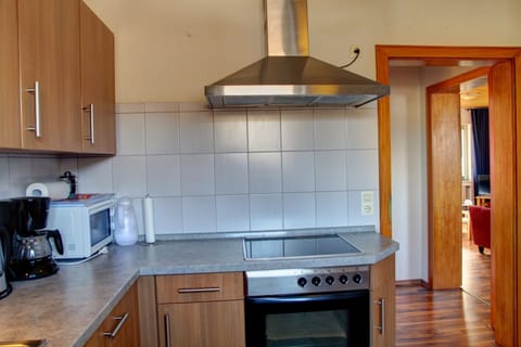 Apartment (Hesborn 5; incl. 60 EUR cleaning fee) | Private kitchen | Fridge, microwave, stovetop, coffee/tea maker