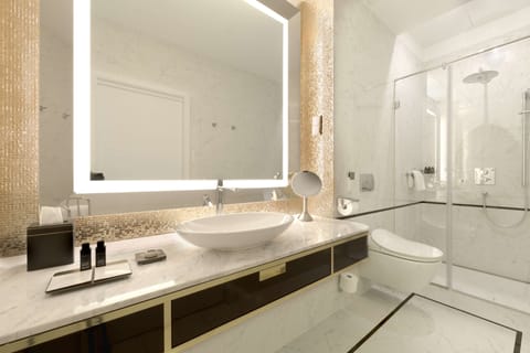 Room, 1 King Bed | Bathroom | Combined shower/tub, rainfall showerhead, designer toiletries