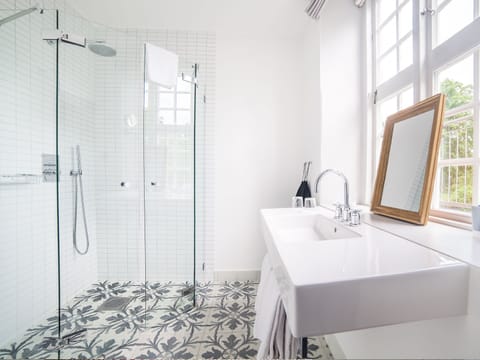 Superior Double Room | Bathroom | Rainfall showerhead, designer toiletries, hair dryer, bathrobes