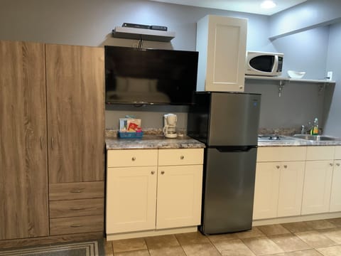 Kitchenette 2 Bed Suite | Private kitchenette | Full-size fridge, microwave, stovetop, coffee/tea maker