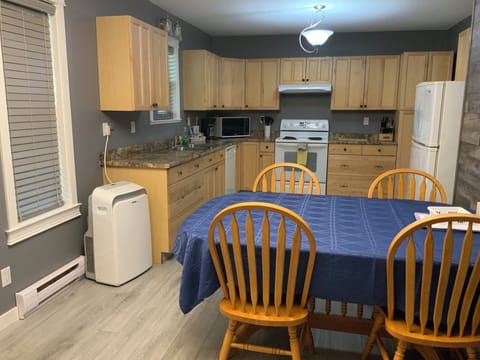 Cottage A | Private kitchen | Full-size fridge, microwave, stovetop, coffee/tea maker