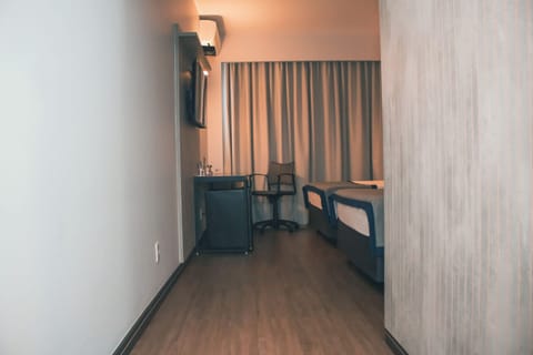 Junior Room, 2 Twin Beds | Minibar, in-room safe, blackout drapes, free WiFi