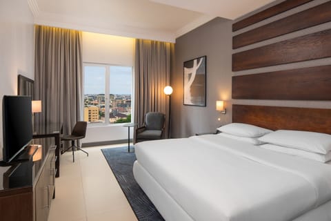 Standard Room, 1 King Bed, City View | 1 bedroom, premium bedding, minibar, in-room safe