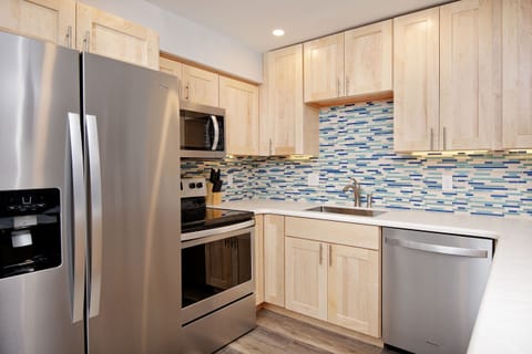 Condo, 1 Bedroom | Private kitchen | Fridge, microwave, oven, dishwasher