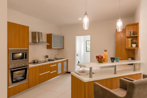 Premier Room, 3 Bedrooms | Private kitchen | Fridge, microwave, stovetop, coffee/tea maker