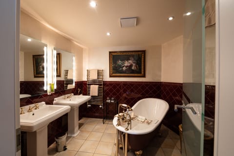 Suite | Bathroom | Hair dryer, bathrobes, towels, soap