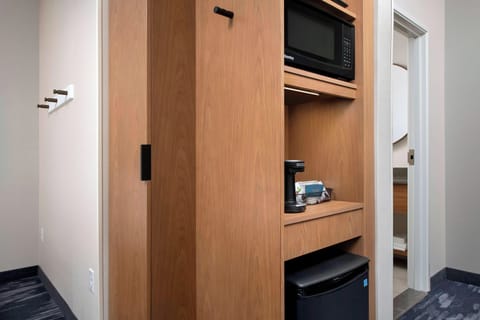 Hypo-allergenic bedding, desk, blackout drapes, iron/ironing board