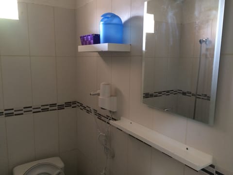 Economy Quadruple Room, Multiple Beds, Non Smoking, Garden View | Bathroom | Shower, towels