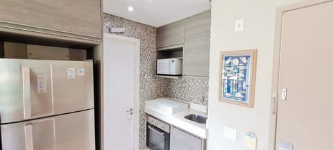 Family Apartment, Garden View | Private kitchen | Fridge, microwave, electric kettle, cookware/dishes/utensils