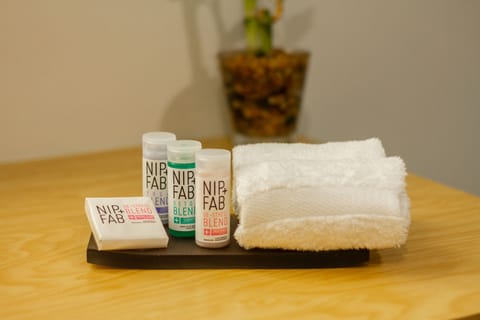 Eco-friendly toiletries, hair dryer, towels, soap