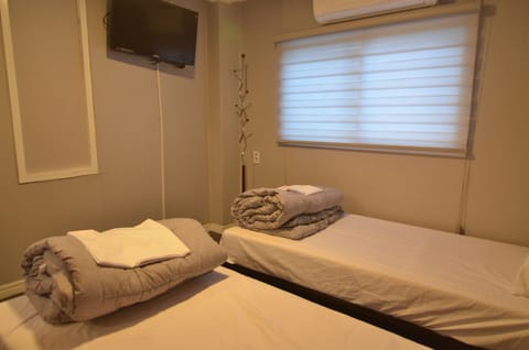 Twin Room | Blackout drapes, soundproofing, free WiFi, bed sheets