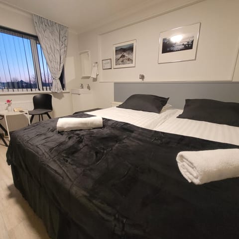 Classic Quadruple Room, Shared Bathroom | Blackout drapes, free WiFi, bed sheets