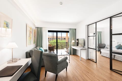 Suite, Terrace, Pool View | Minibar, in-room safe, desk, blackout drapes