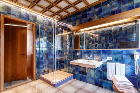 Superior Suite, Balcony, Pool View | Bathroom | Free toiletries, hair dryer, bidet, towels