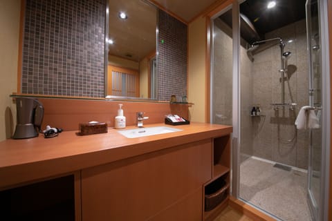 Japanese-Western Style Room | Bathroom | Shower, free toiletries, hair dryer, bidet