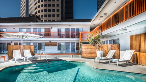 Outdoor pool, a heated pool, sun loungers