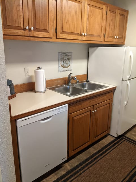 Water View Condo | Private kitchen | Full-size fridge, microwave, oven, stovetop