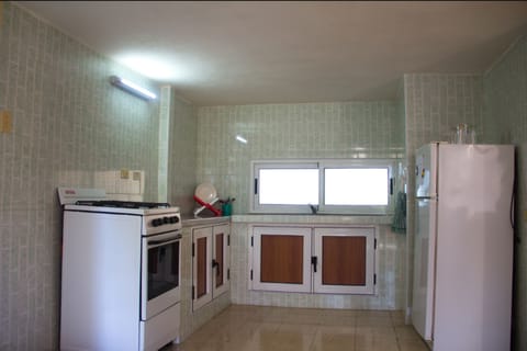 Deluxe Bungalow, Multiple Beds, Non Smoking, Garden View | Private kitchen | Full-size fridge, stovetop, cookware/dishes/utensils