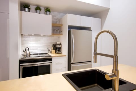 Loft, 1 Bedroom, King Bed (SR201) | Private kitchen | Full-size fridge, microwave, oven, stovetop