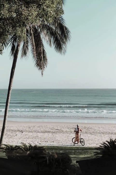 On the beach, sun loungers, beach umbrellas, beach towels