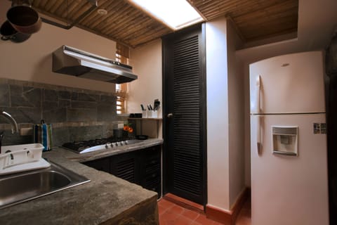 House, Multiple Beds (El polvorete) | Private kitchen | Full-size fridge, microwave, oven, stovetop