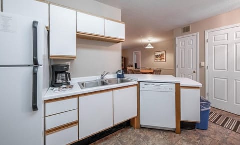 Deluxe Condo | Private kitchen | Full-size fridge, microwave, oven, dishwasher