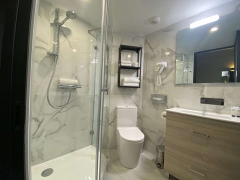 Shower, free toiletries, hair dryer, towels