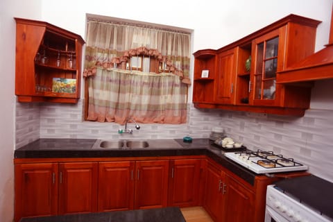 Family Villa, Multiple Beds, Garden View | Shared kitchen | Cookware/dishes/utensils