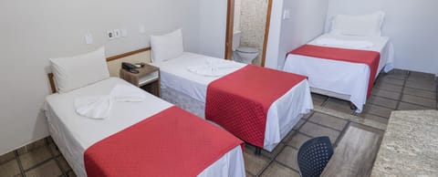 Deluxe Triple Room | Minibar, blackout drapes, free WiFi, bed sheets