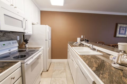 Suite, 1 Bedroom | Private kitchen | Full-size fridge, microwave, oven, stovetop