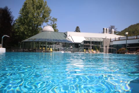 Indoor pool, 2 outdoor pools, open 9:00 AM to 8:00 PM, pool umbrellas