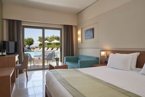 Standard Room, Partial Sea View | In-room safe, individually decorated, individually furnished, desk