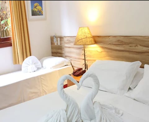 Standard Triple Room | Minibar, in-room safe, free WiFi, bed sheets