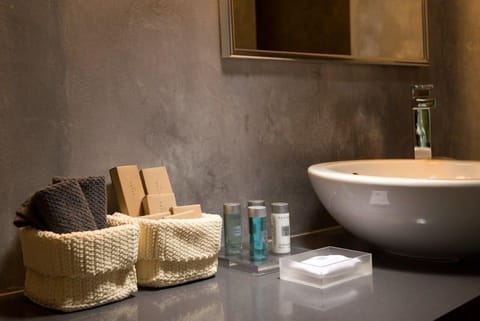 Superior Room | Bathroom | Rainfall showerhead, designer toiletries, hair dryer, bathrobes