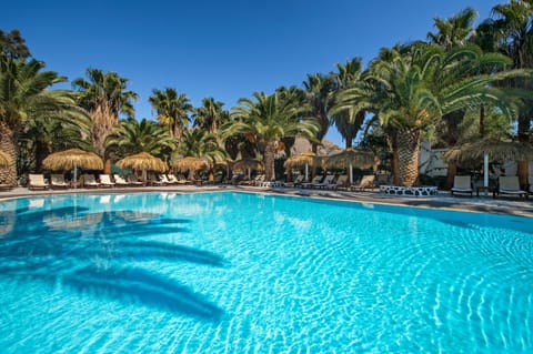 Outdoor pool, open 8:00 AM to 8:00 PM, pool umbrellas, sun loungers