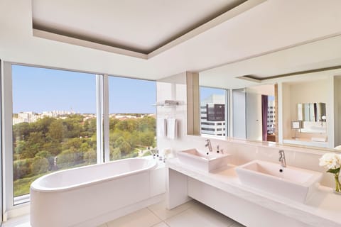 Junior Suite, Park View | Bathroom | Combined shower/tub, eco-friendly toiletries, hair dryer, bathrobes