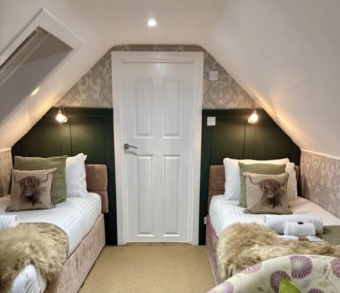 Twin Room (Top Floor) | Iron/ironing board, free WiFi, bed sheets