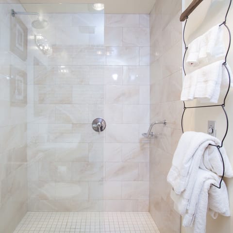 Rainfall showerhead, designer toiletries, hair dryer, bathrobes