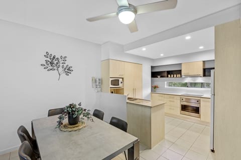 Deluxe Two Bedroom Apartment | Private kitchen | Full-size fridge, microwave, stovetop, dishwasher